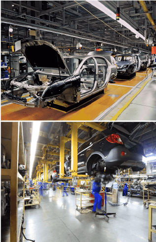 automobiles being assembled in factory